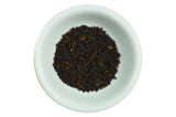 Dry decaf Assam tea leaves