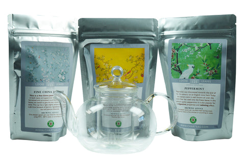 Loose-leaf tea gift set including Fine China Jasmine, Peppermint and Chamomile tea with a glass teapot